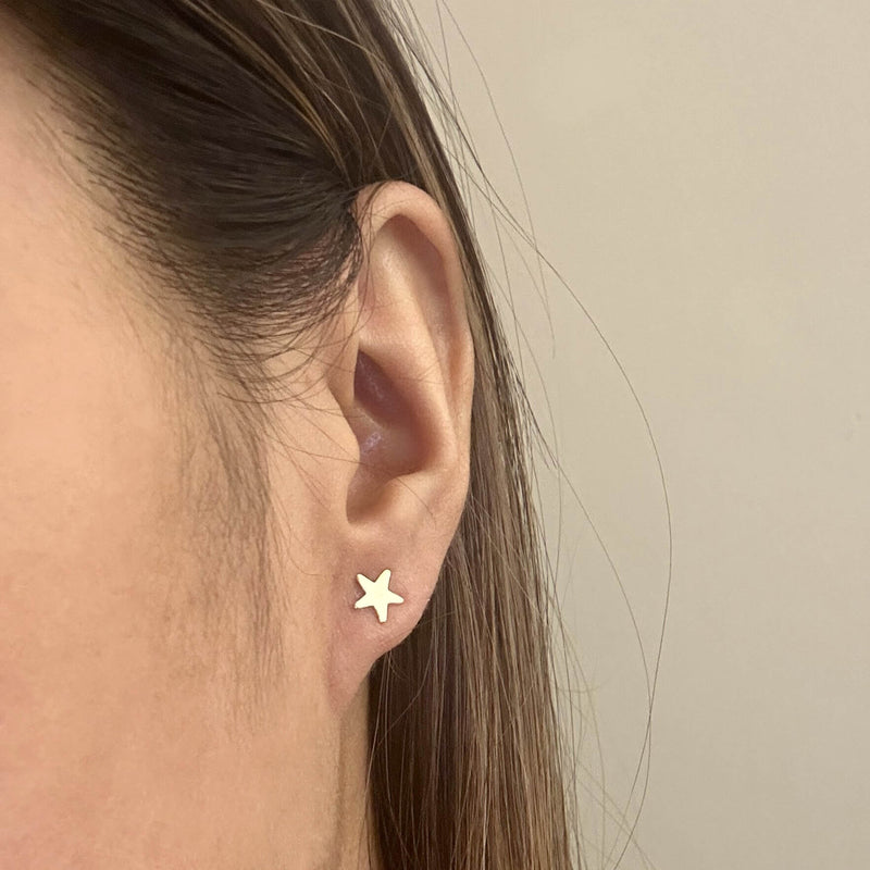 Close-up of Twinkle Star Studs highlighting intricate detailing and shine